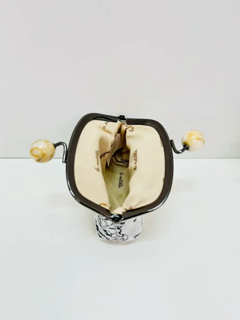 Monedero bolitas Rosa Negra 1.webp